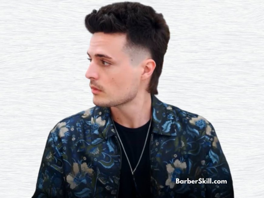 Mini mullet with textured top, longer back, and faded sideburns.