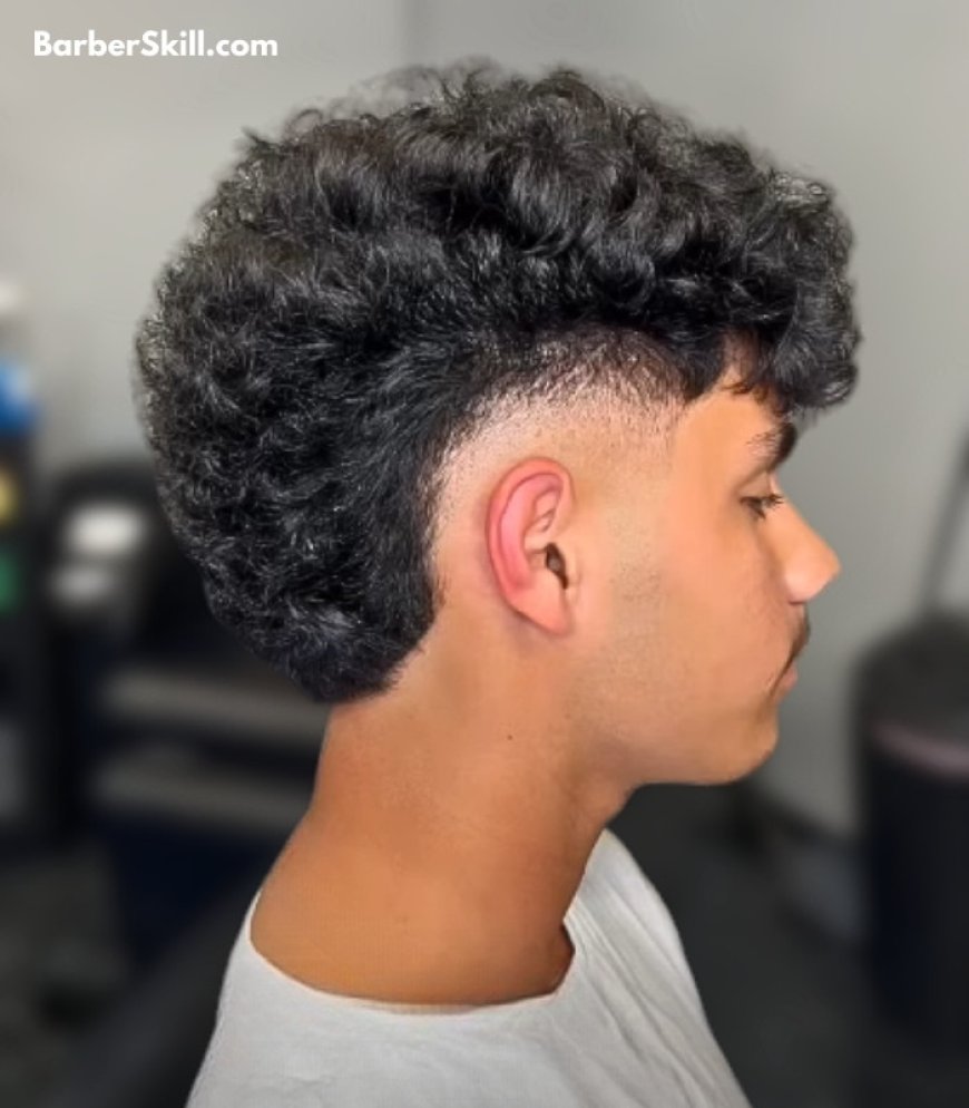 A man with Curly Top Burst Fade haircut