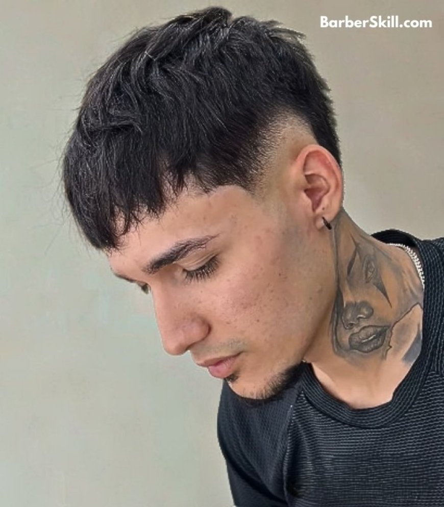 A man having Textured Crop with Burst Fade haircut